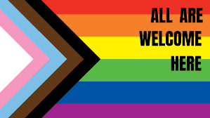LGBTQIA+ Pride flag with the words "All Are Welcome Here"